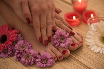 Fototapeta na wymiar female feet and hands at spa salon