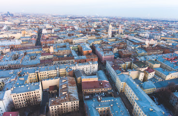 Beautiful super wide-angle summer aerial view of Saint-Petersburg, Russia with skyline and scenery beyond the city and Nevsky Prospect, seen from the quadrocopter air drone