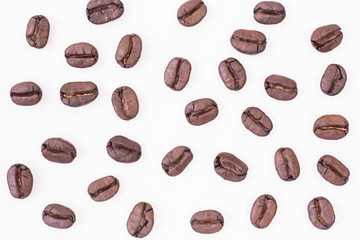 Roasted coffee beans on white background