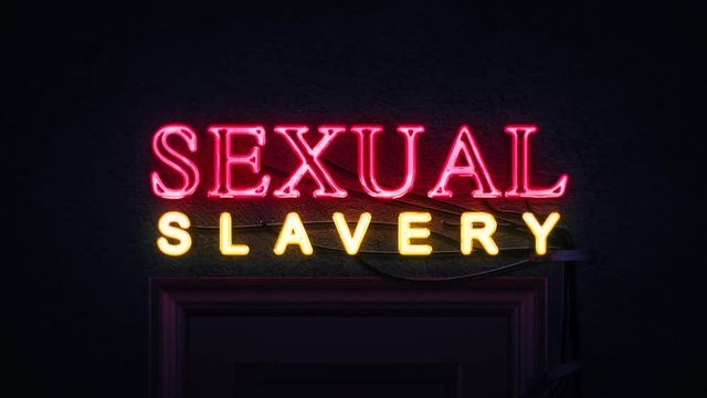 Sexual Slavery Neon Sign Turning on and Off