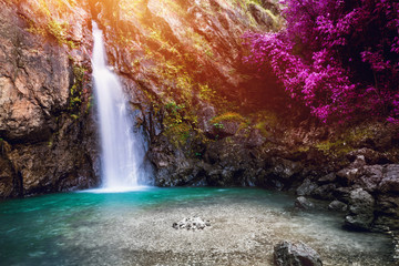 Obraz na płótnie Canvas Natural background waterfall. waterfall