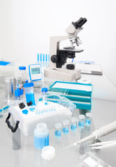 Science background with microscopic work station