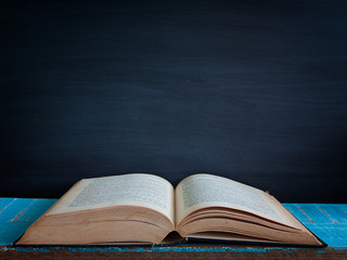 Blackboard and  books. (vintage)