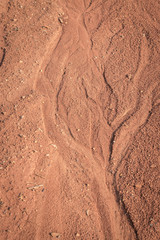 Red dirt (soil) background or texture.