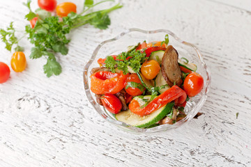 Warm salad with vegetables