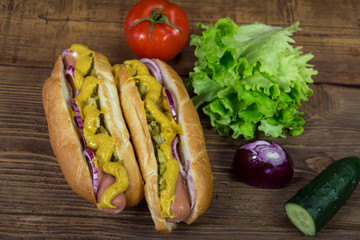 Hot dog with onion, mustard and pickles