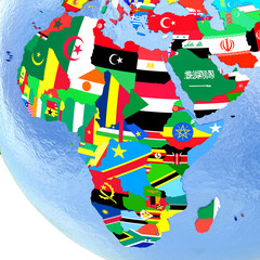 Africa on political globe with flags