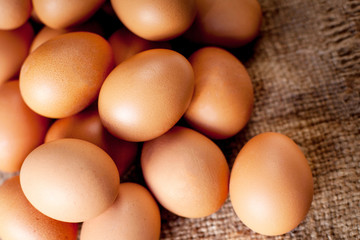  Eggs on wooden  background closeup