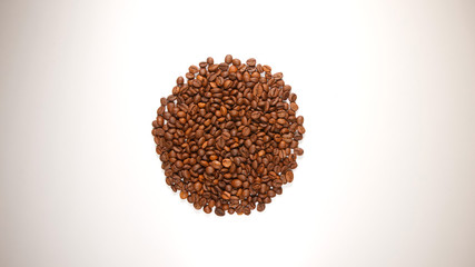 TOP VIEW: Circle symbol from a coffee beans on a white table