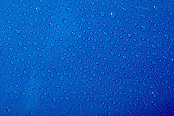 Water drops on the blue background