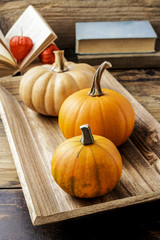 Pumpkins on wooden table.