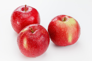 Drops of water on red apples
