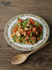 Vintage style Thai traditional and Chinese food stir fried vegetable in brown sauce with dried shrimp
