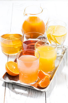 assortment of fresh citrus juices