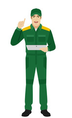 Man in uniform holding digital tablet PC and pointing up
