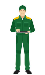 Man in uniform uses tabletdigital tablet PC