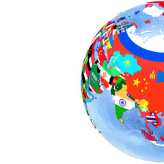 Asia on political globe with flags