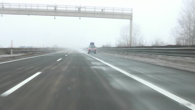 Car Driving  Highway during Foggy day