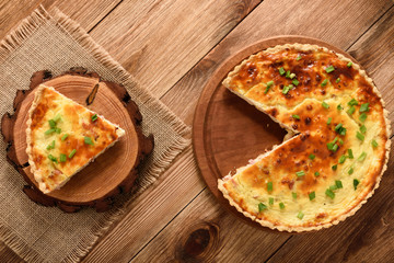 Traditional french pie with bacon and cheese - quiche lorraine.