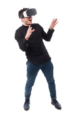 Amazed man experiencing virtual reality through a headset