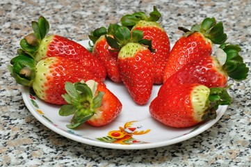 A Delicious Dessert of Strawberries on a White Plate