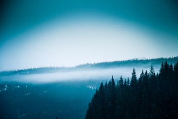 A beautiful, dramatic, colorful winter landscape with mountains in Norway