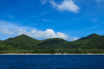 Fototapeta na wymiar Long Stretch of White Sand Beach on Linapacan Island, Palawan