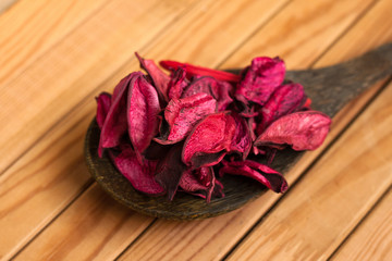 Selective Focus, Dry flower on the spoon over the wood table