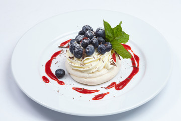 Meringue cake Pavlova with blueberry