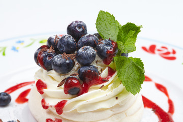 Meringue cake Pavlova with blueberry