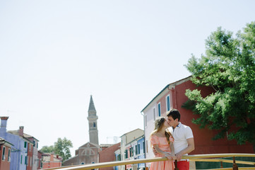 Young couple kissing in Burano, Venice