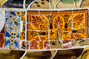 ceramic tile mosaic decoration, broken glass, Park Guell, Barcelona, Spain. Designed by Gaudi