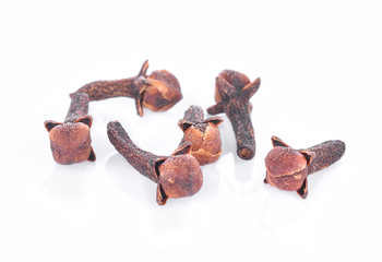 dry cloves on white background