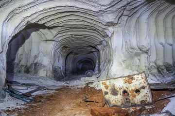 Chalk mine tunnel with traces of drilling machine