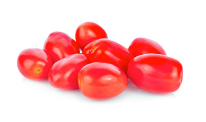 San marzano plum tomatoes with leaves on white background