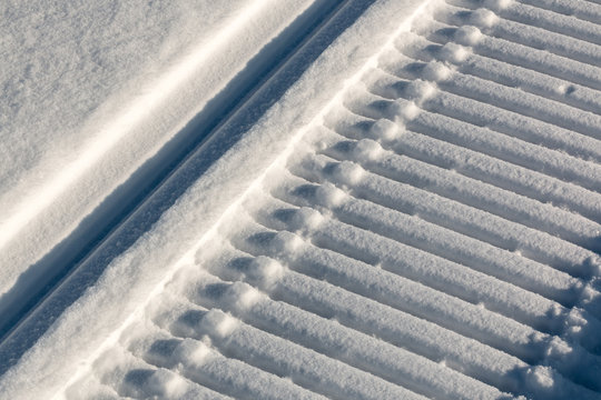 Close-up shot of snowmobile trail