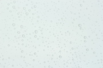 Water drop on white roof car, white background