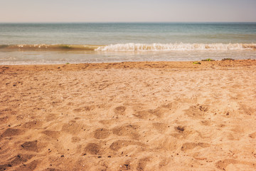 Shore of sea. Yellow sand and water. Good place for summer rest. Paradise far from civilization.
