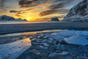 Colordul sunset on the baech, Norway, Lofoten Islands.