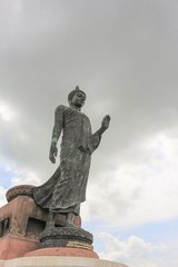 Fototapeta premium Big Buddha statue ancient on blue sky background in Nakhon Pathom Province of Thailand