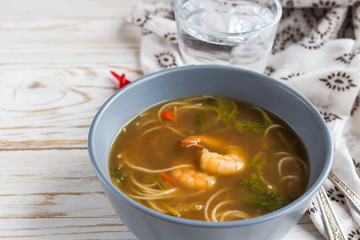 Simple Thai soup with shrimp, lemongrass, chilli and noodles