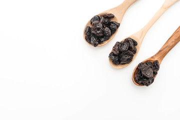 black raisins on white