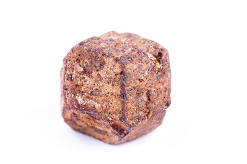 Macro stone mineral Garnet against white background