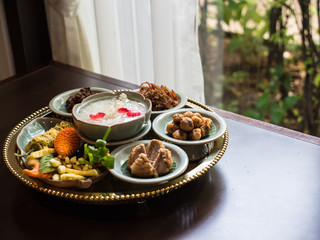 Rice in cool water with side dish