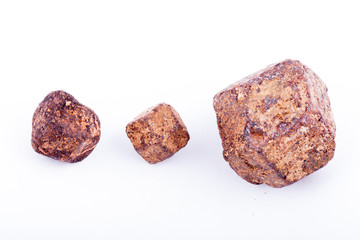 Macro stone mineral Garnet against white background