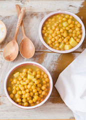 Chickpea soup on wooden background. Top view. Selective focus. Eastern cuisine