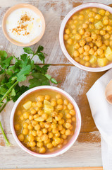 Chickpea soup on wooden background. Top view. Selective focus. Eastern cuisine