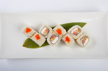 sushi roll with omelette and Philadelphia cheese with salmon and red caviar