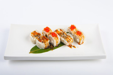 sushi roll with tuna, scrambled eggs, cream cheese and red caviar