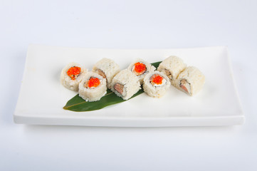 sushi roll with cream cheese, salmon, scrambled eggs, red caviar